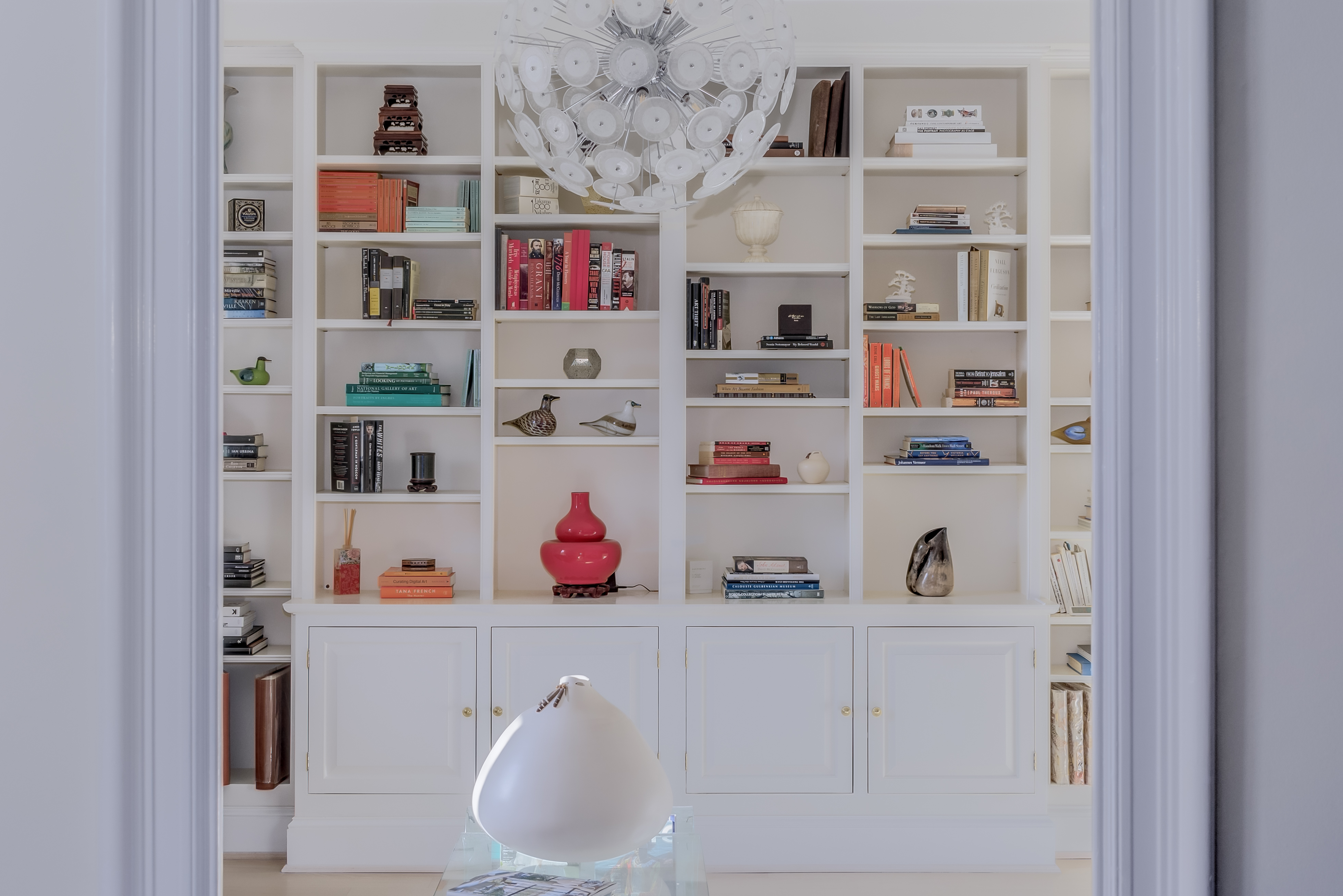 2022 Columbia Road Northwest, Unit 202 Washington, DC 20009 - Photo 5 of 15 a shelf with books and knick knacks on it