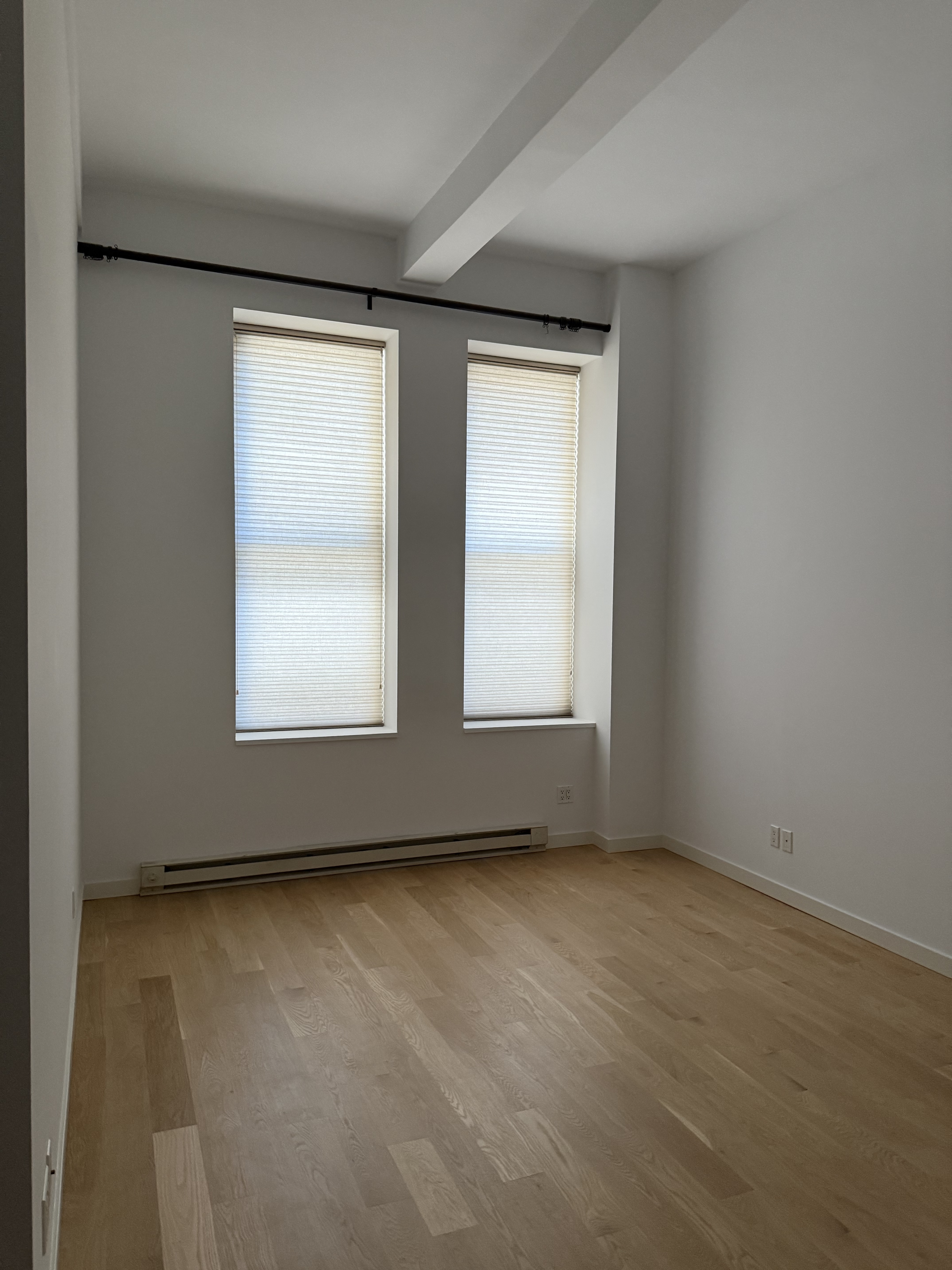 11 East 36th Street, Unit 503 Manhattan, NY 10016 - Photo 16 of 17 an empty room with a window
