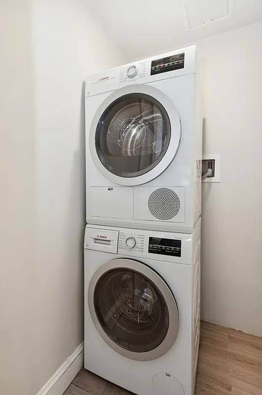 189 Woodpoint Road, Unit 4 Brooklyn, NY 11211 - Photo 5 of 6 a utility room with dryer and washer