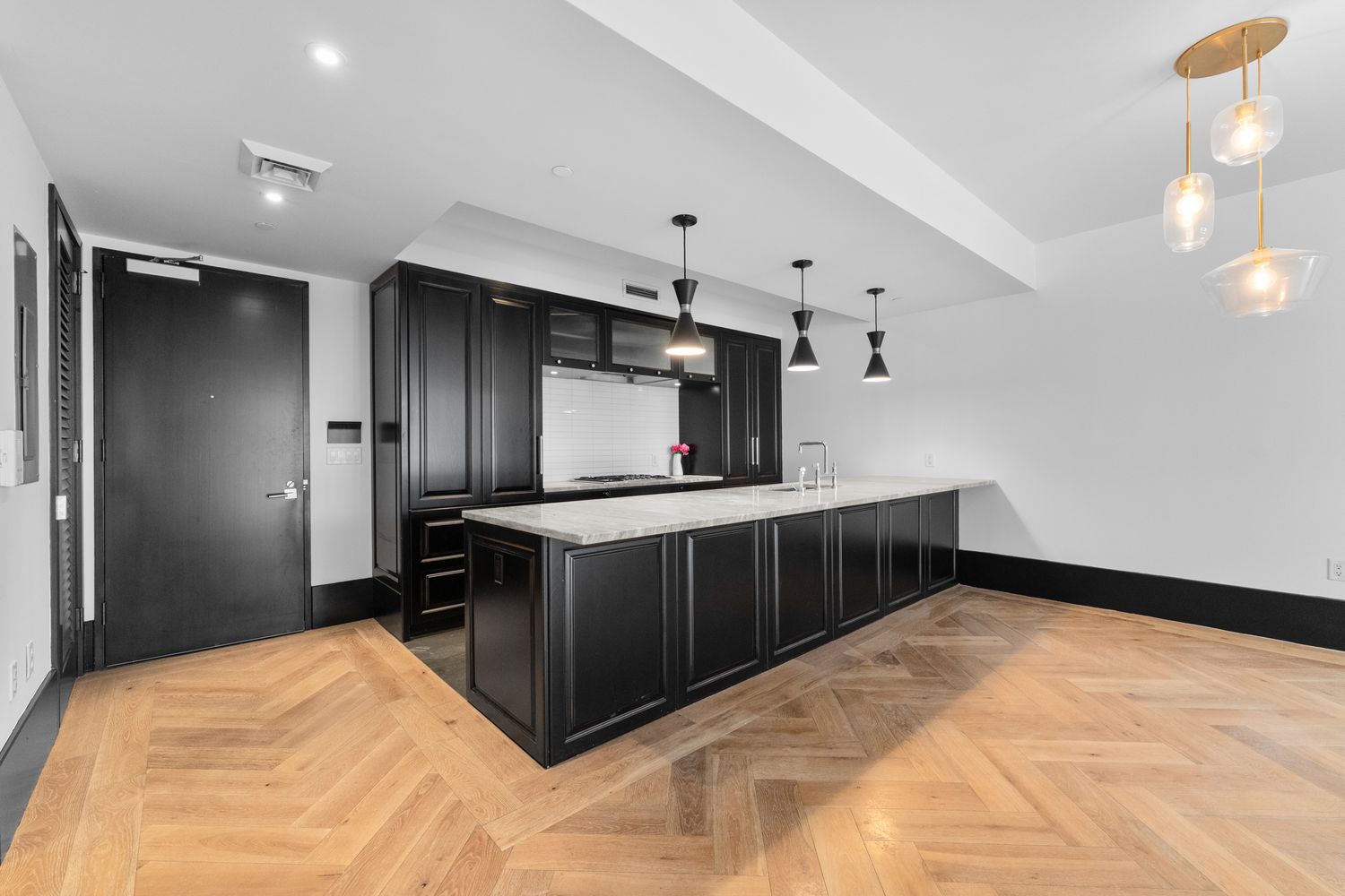 a kitchen with stainless steel appliances a stove and a refrigerator