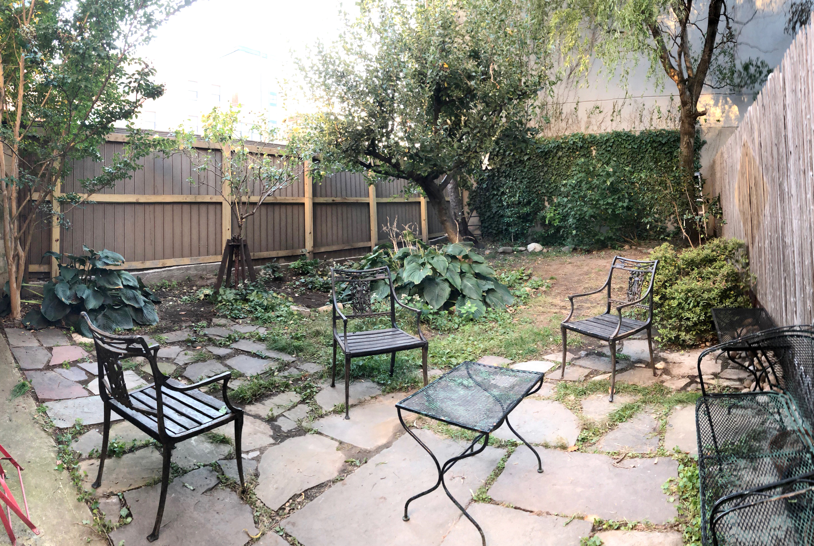 658 Classon Avenue Brooklyn, NY 11238 - Photo 12 of 15 a view of a chairs and table in backyard