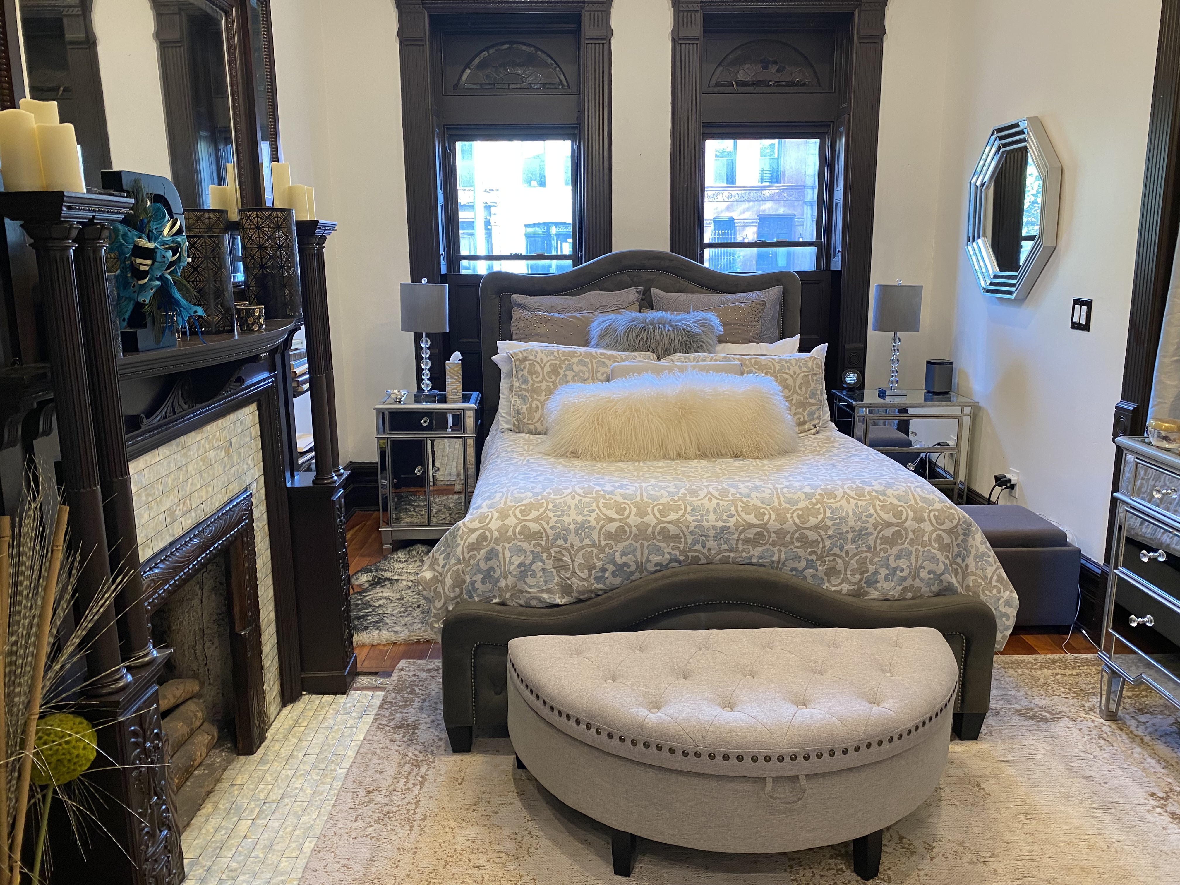 493 Decatur Street, Unit 1 Brooklyn, NY 11233 - Photo 4 of 26 a bed room with a bed and a mirror