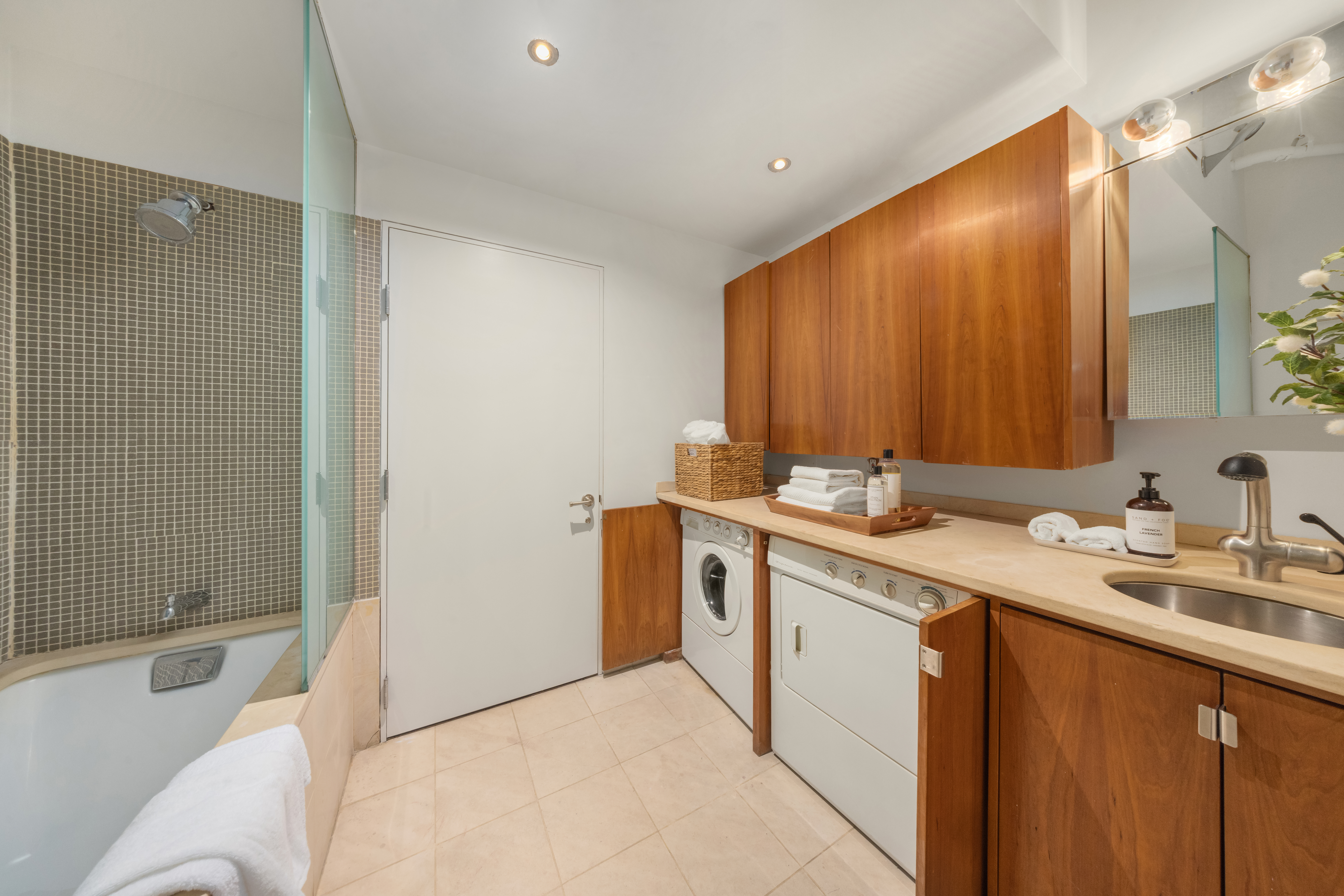 170 5th Avenue, Unit 5 Manhattan, NY 10010 - Photo 19 of 22 a bathroom with a sink and a mirror