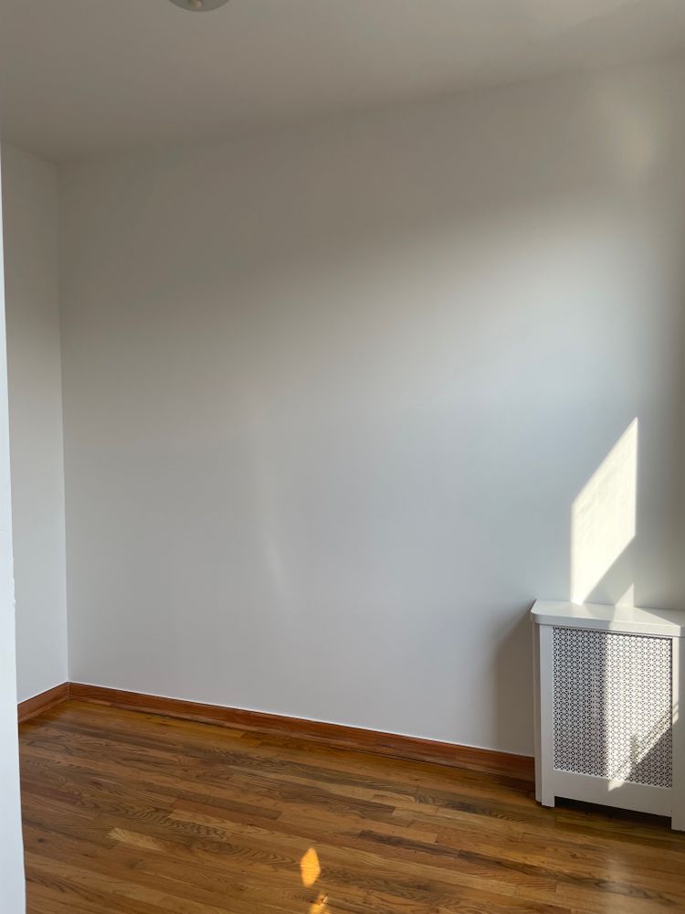 250 19th Street, Unit 3A Brooklyn, NY 11215 - Photo 15 of 15 a view of an empty room with wooden floor and a window