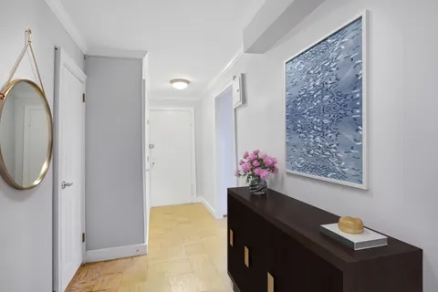 a view of a hallway with workspace