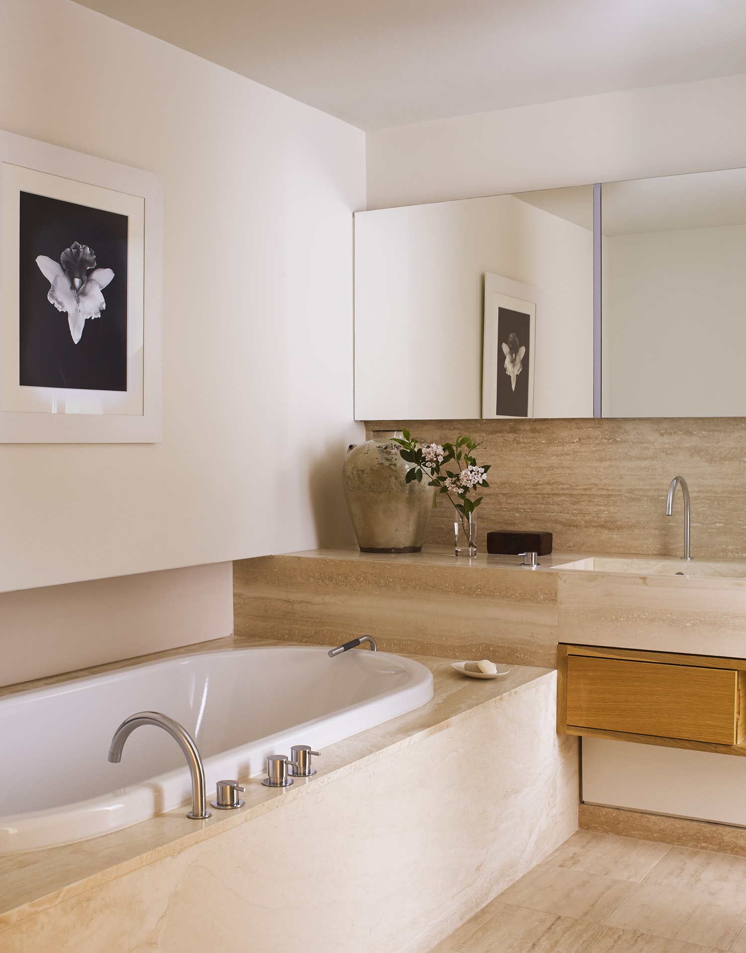 50 Gramercy Park North, Unit 5A Manhattan, NY 10010 - Photo 9 of 10 a bathroom with a tub sink and mirror