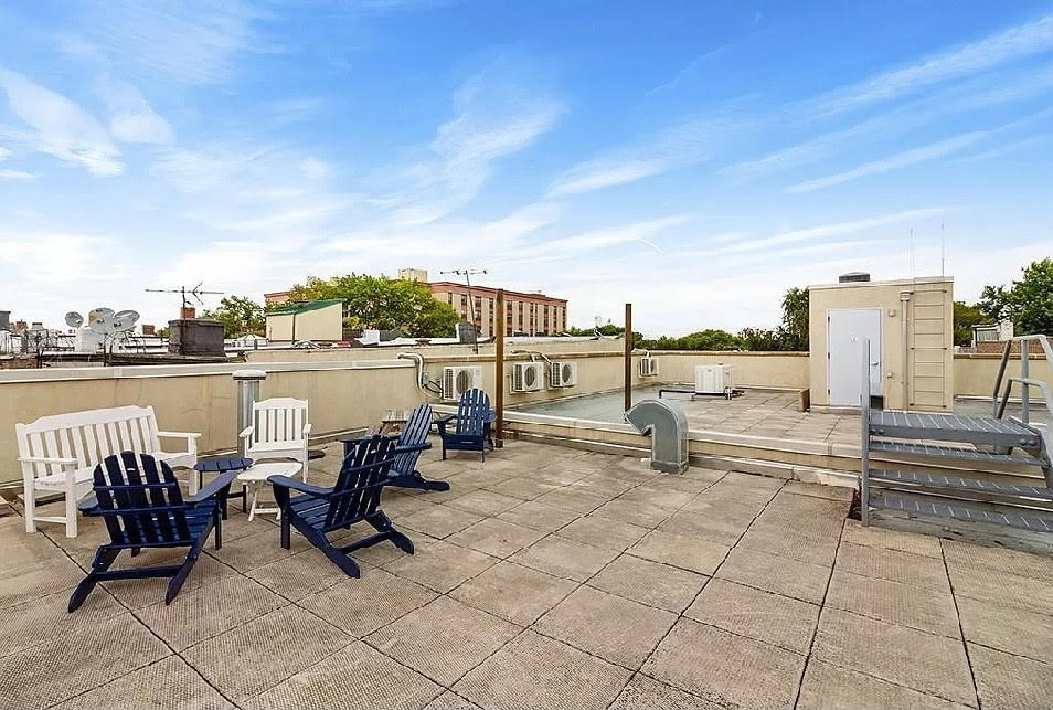 1638 8th Avenue, Unit 1B Brooklyn, NY 11215 - Photo 9 of 12 a view of swimming pool with outdoor seating and city view