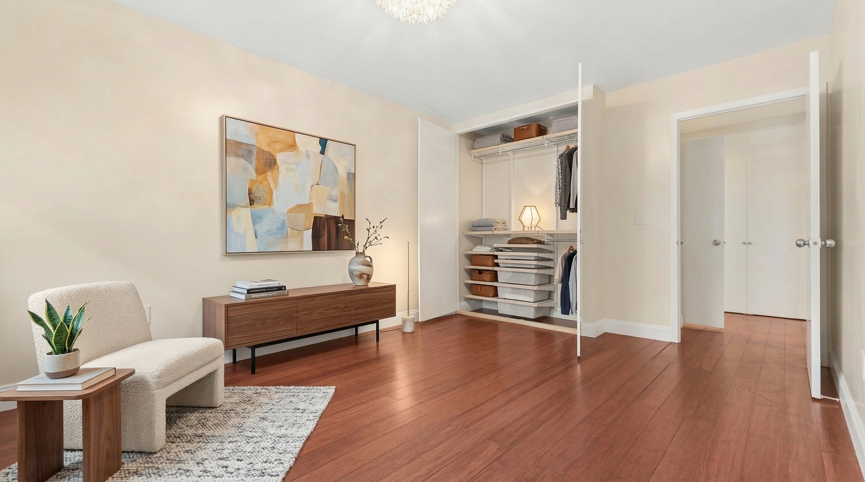 1919 Madison Avenue, Unit 418 Manhattan, NY 10035 - Photo 11 of 16 a spacious bedroom with a bed and a couch