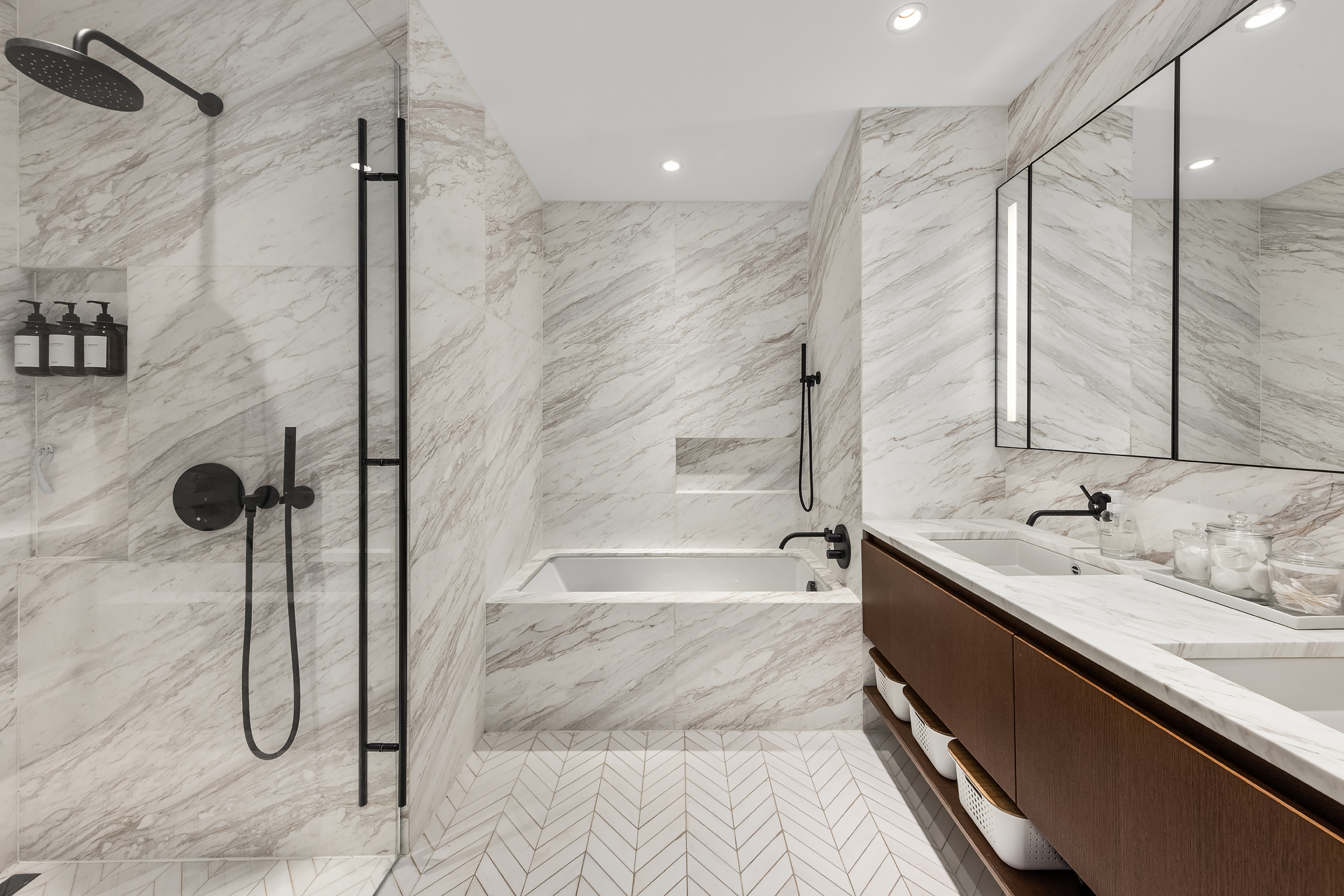 570 Broome Street, Unit 6A Manhattan, NY 10013 - Photo 8 of 17 a bathroom with a tub sink and shower