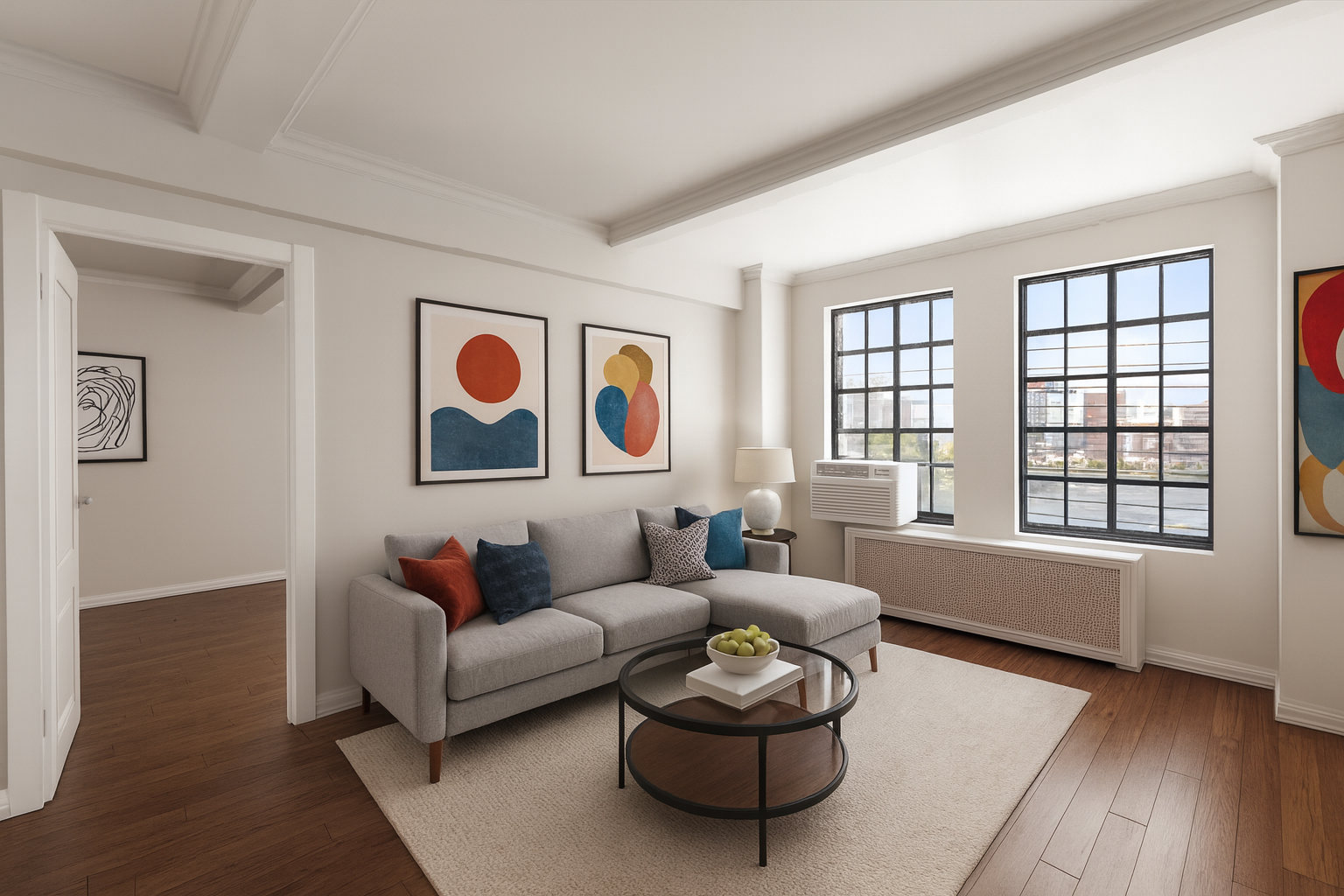 5 Tudor City Place, Unit 1132 Manhattan, NY 10017 - Photo 2 of 9 a living room with furniture and a window