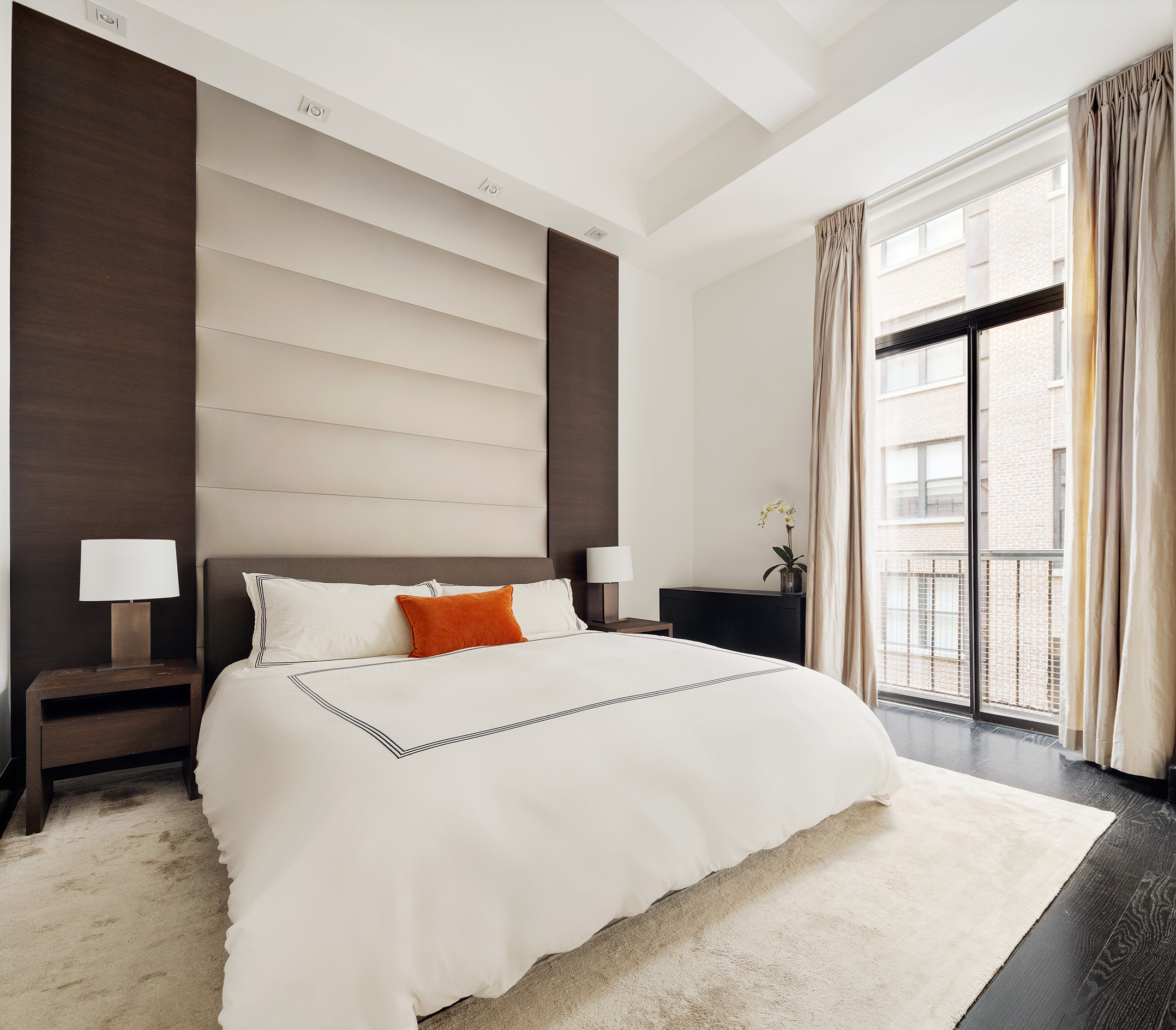 Park Ave S, Unit 7PR Manhattan, NY 10010 - Photo 6 of 15 a bedroom with a large bed and a large window