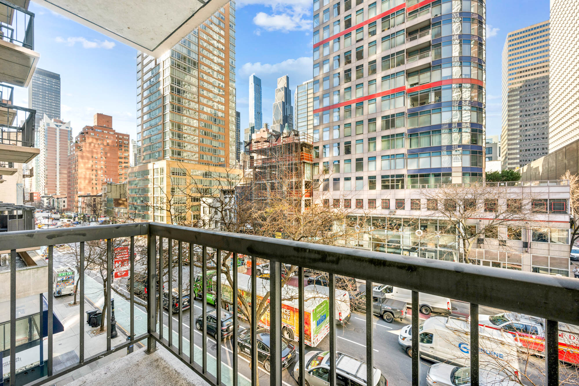 300 East 54th Street, Unit 3H Manhattan, NY 10022 - Photo 8 of 10 a city view from a balcony