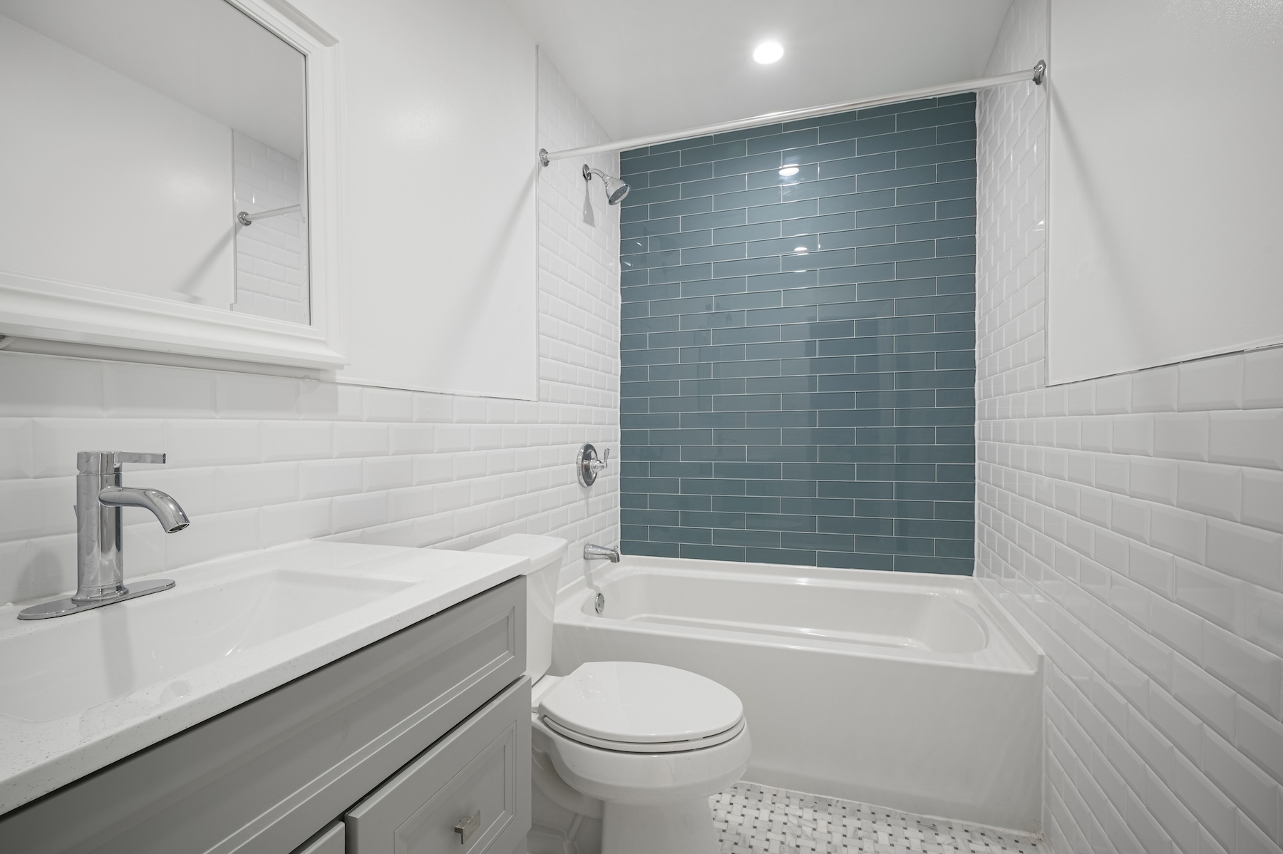 307 West 136th Street Manhattan, NY 10030 - Photo 12 of 26 a bathroom with a sink a toilet and shower