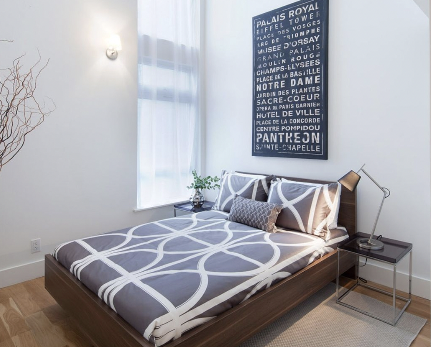 105 Grand Avenue, Unit 4L Brooklyn, NY 11205 - Photo 4 of 10 a bedroom with a bed and a window