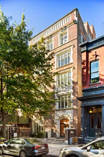 a black and white photo of a living room