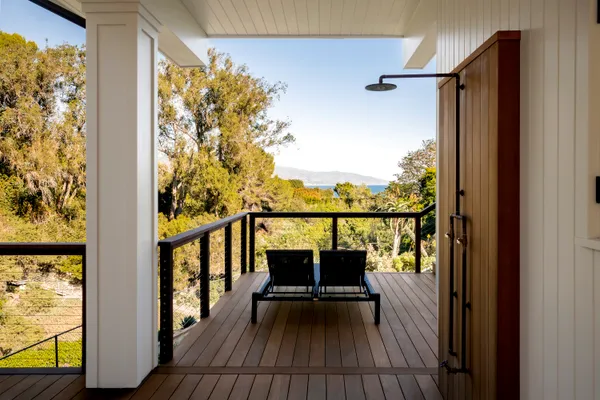 a kitchen with a refrigerator and a stove
