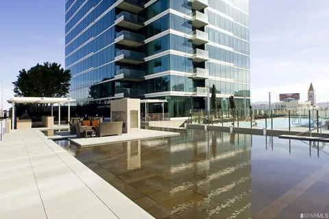 a view of a balcony with chairs