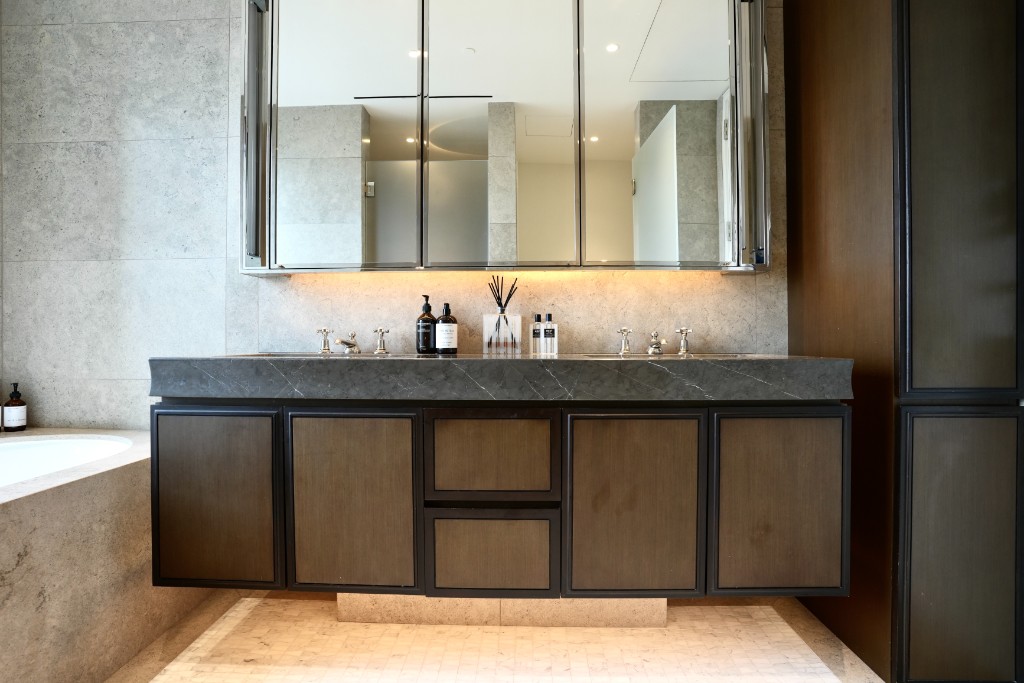 5 Beekman Street, Unit 43A Manhattan, NY 10038 - Photo 10 of 33 a bathroom with a sink and a mirror