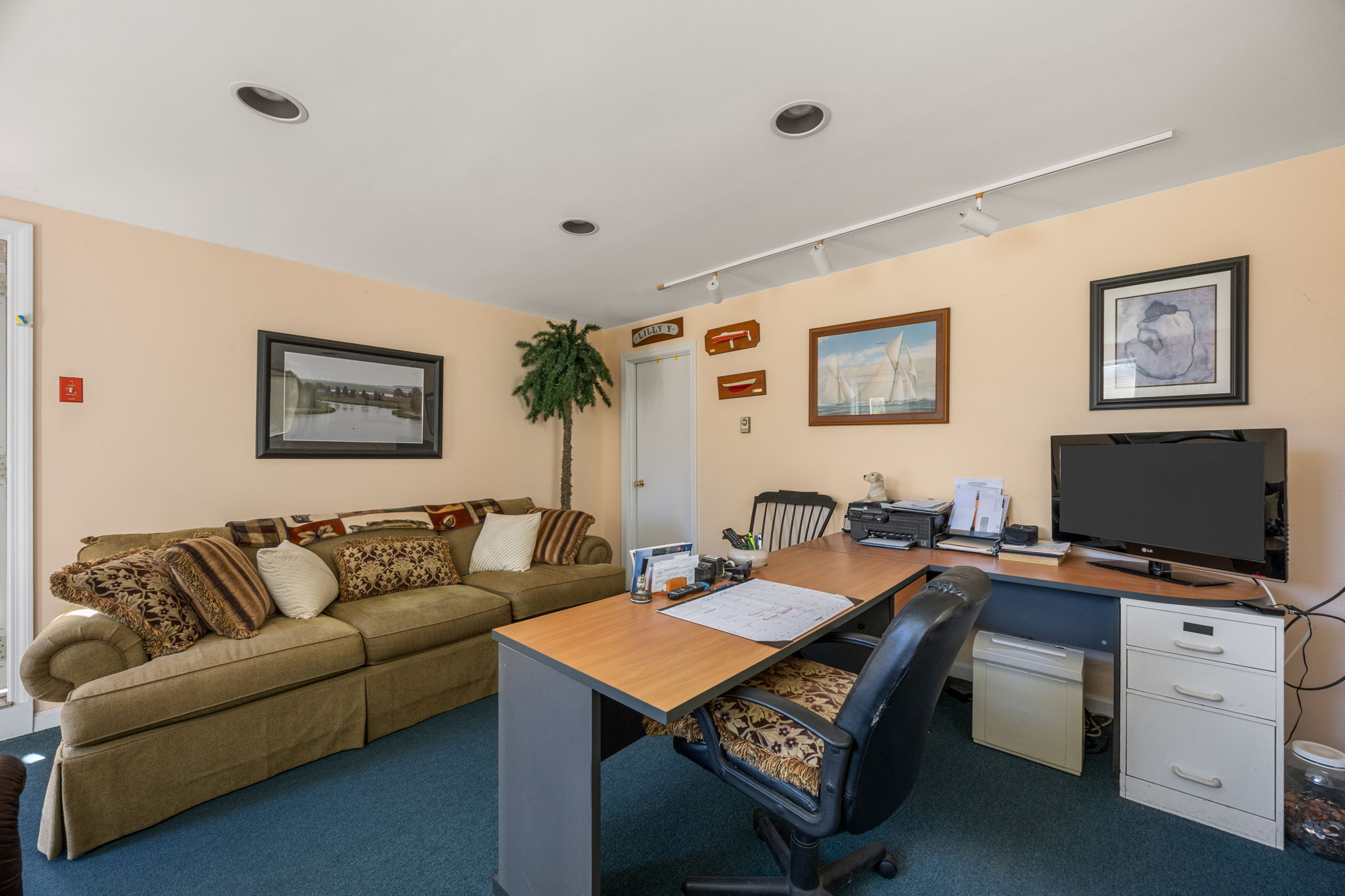9 Rayber Road Orleans, MA 02653 - Photo 21 of 31 a living room with furniture and a flat screen tv