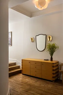 a black and white photo of a living room