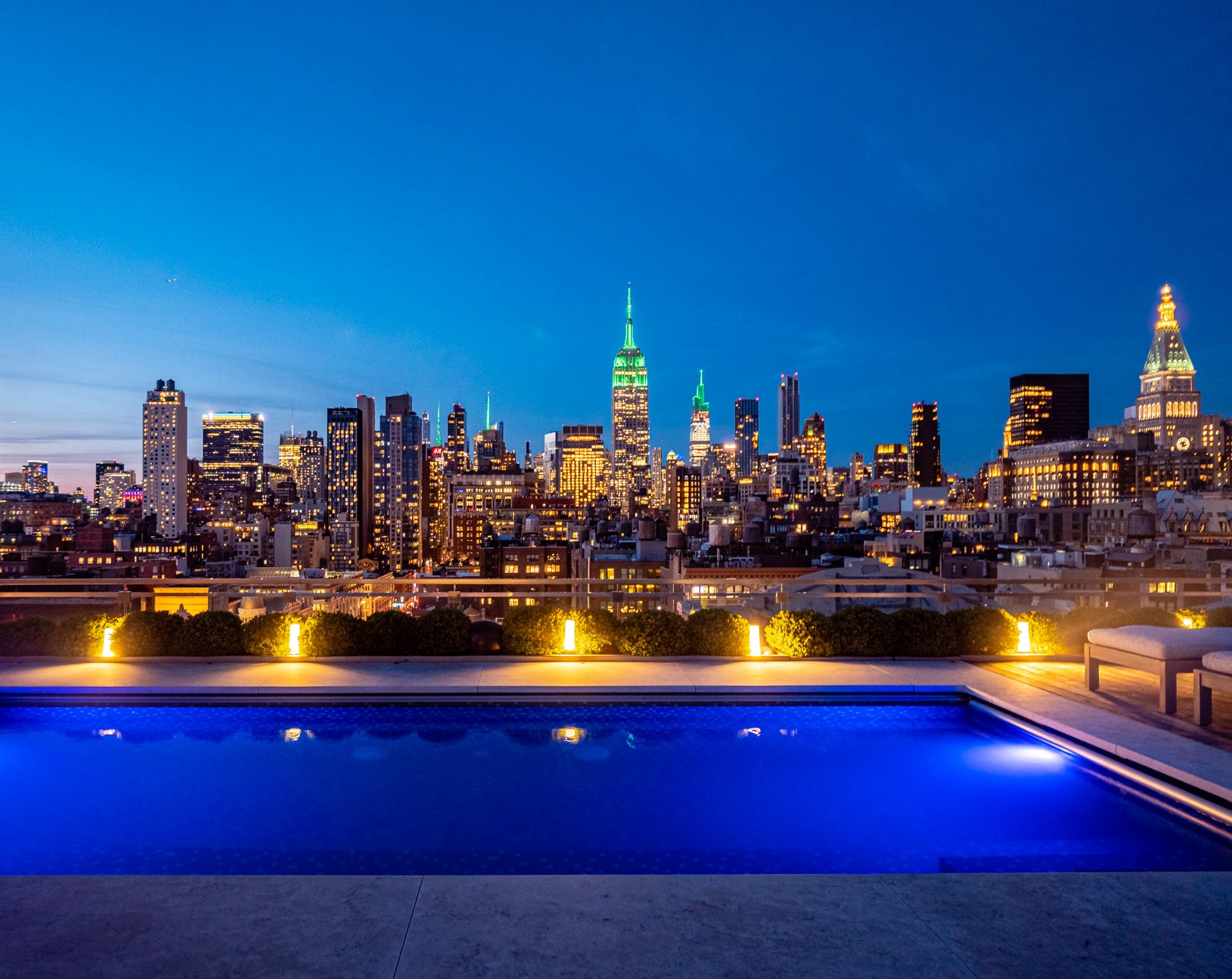 55 West 17th Street, Unit PH Manhattan, NY 10011 - Photo 2 of 36 a view of a swimming pool with outdoor seating
