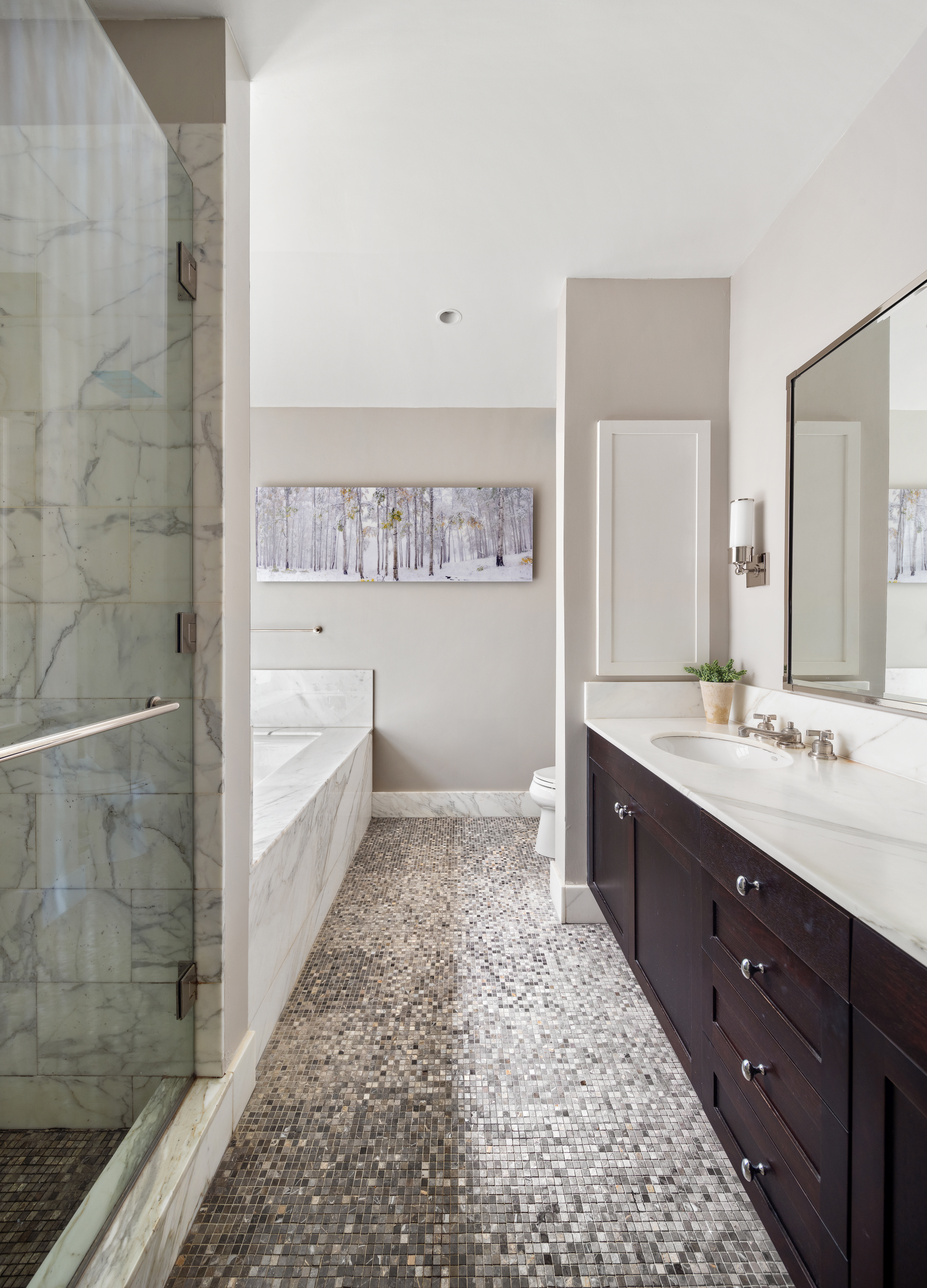 130 West 30th Street, Unit 3B Manhattan, NY 10001 - Photo 12 of 15 a bathroom with a double vanity sink toilet mirror and bathtub