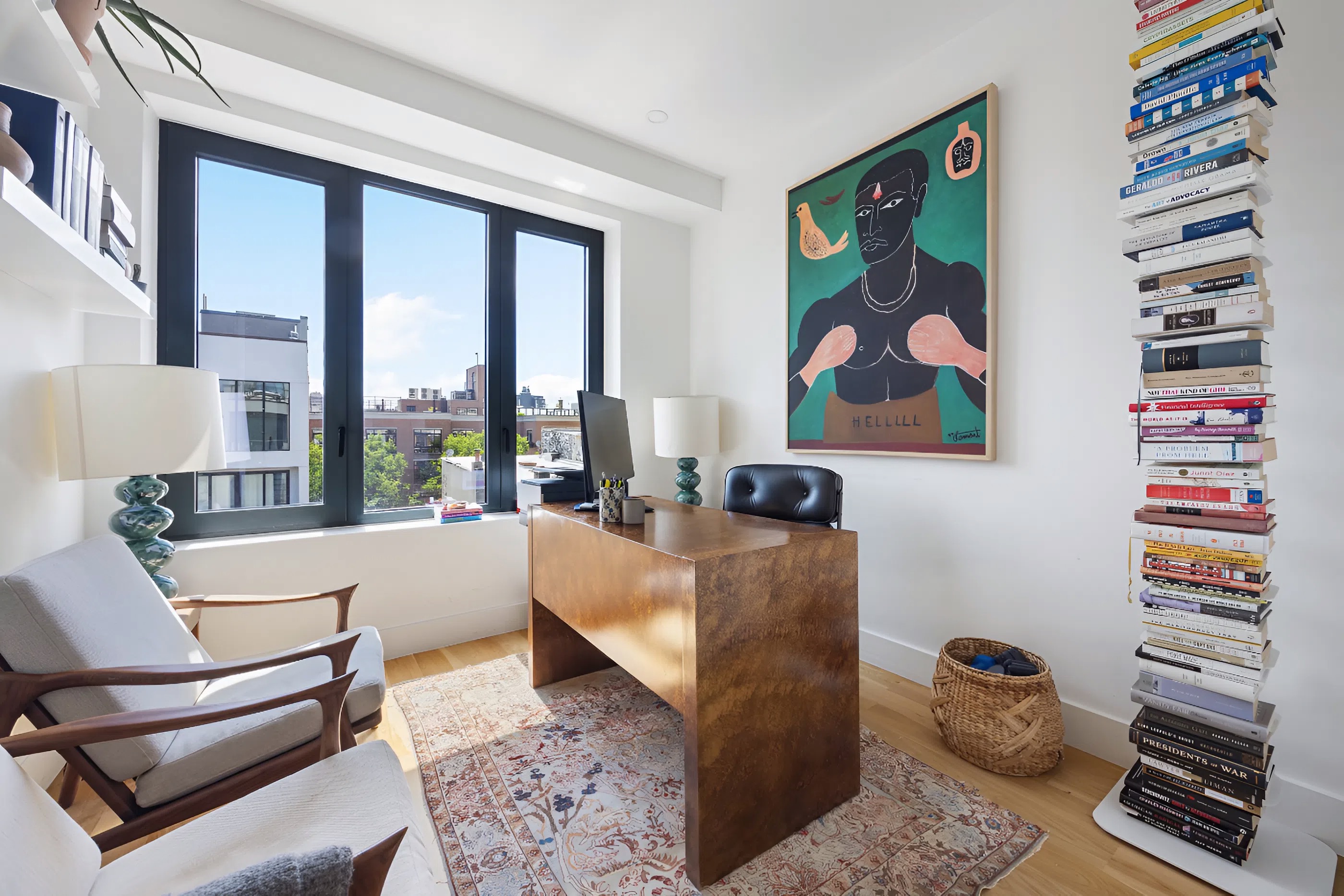 340 Metropolitan Avenue, Unit PHB Brooklyn, NY 11211 - Photo 7 of 18 a living room with furniture and a painting on the wall