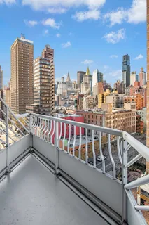 a view of city with tall buildings