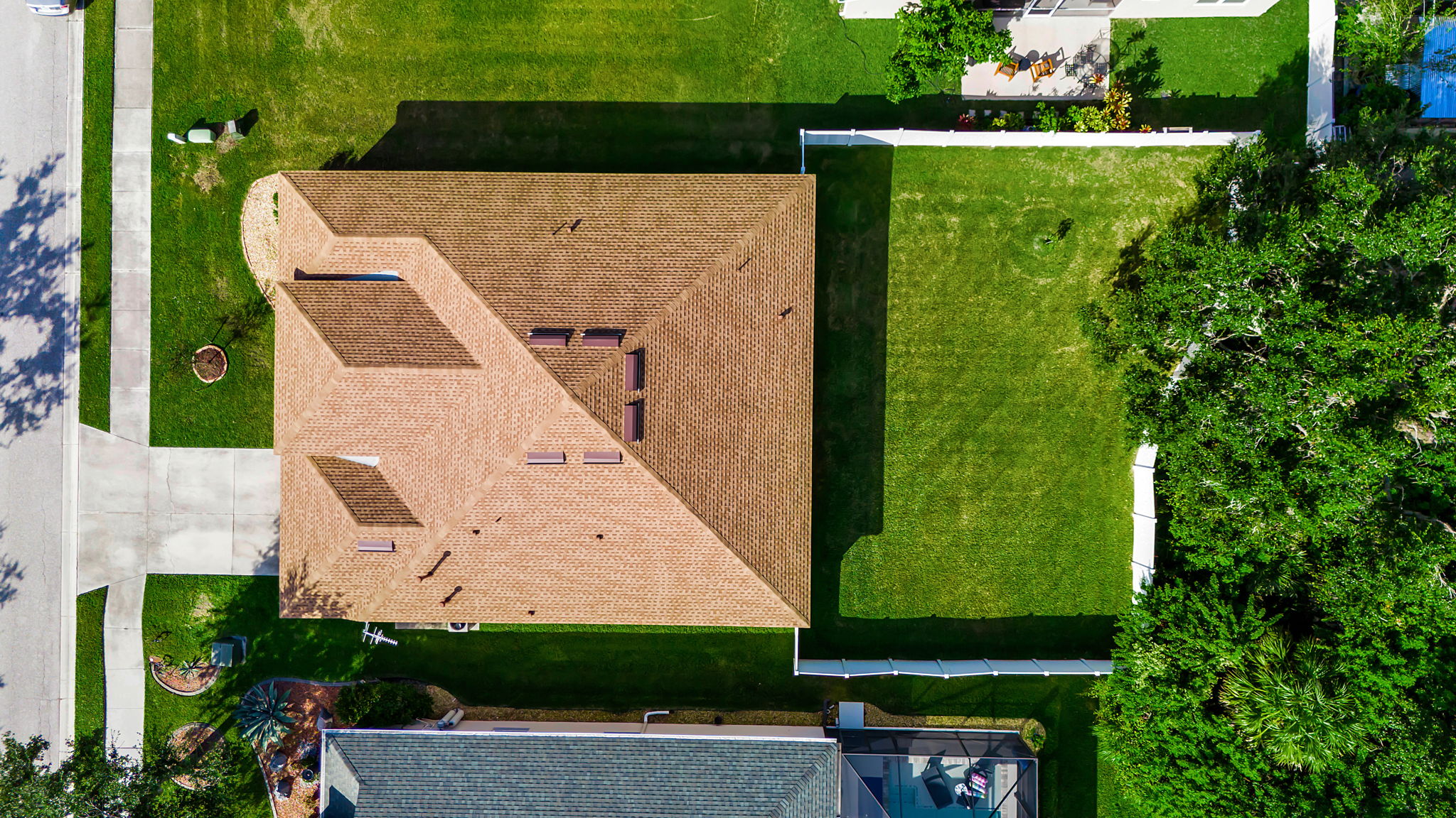 6106 34th Court East Bradenton, FL 34203 - Photo 2 of 69 an aerial view of a house with a garden