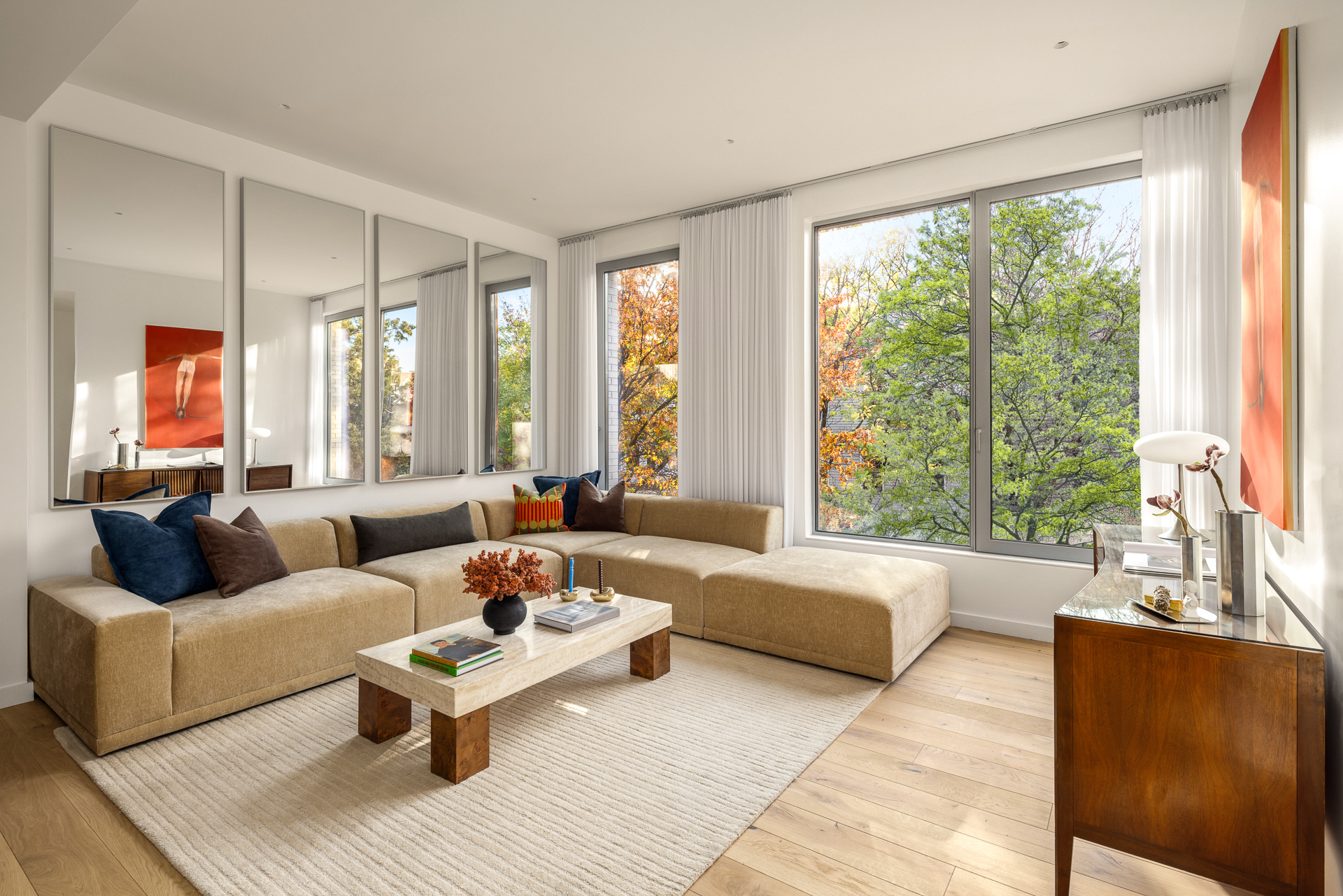 584 Leonard Street, Unit PHB Brooklyn, NY 11222 - Photo 3 of 22 a living room with furniture and a large window