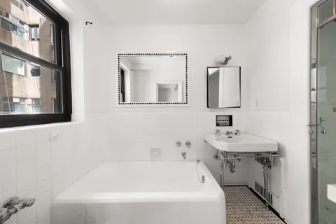 a bathroom with a sink and a bathtub