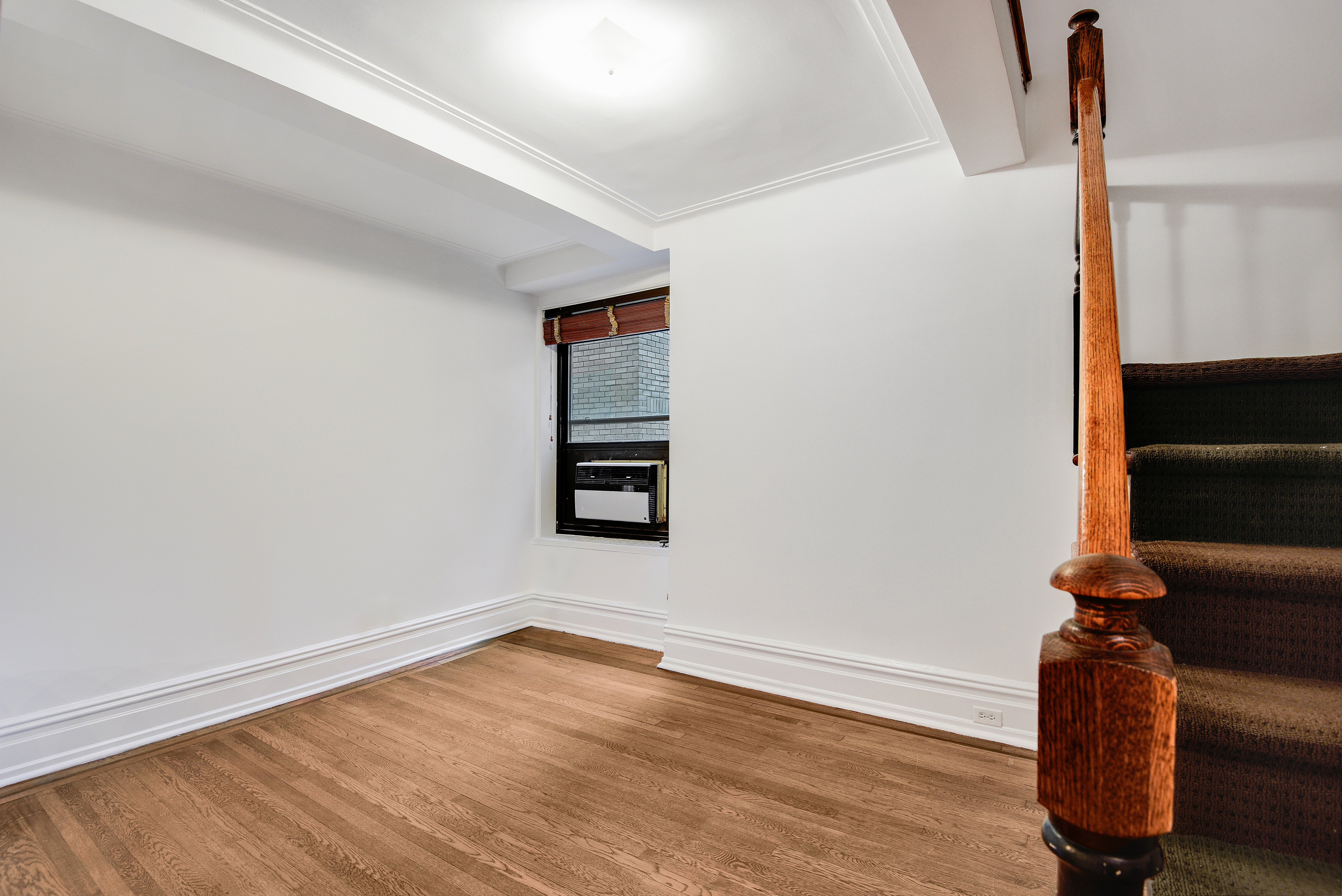 7 Park Avenue, Unit 8A9ABC Manhattan, NY 10016 - Photo 19 of 23 a view of empty room with wooden floor