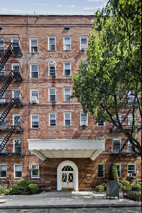 55 Eastern Parkway, Unit 6F Brooklyn, NY 11238 - Photo 6 of 10 a front view of a building with parking space
