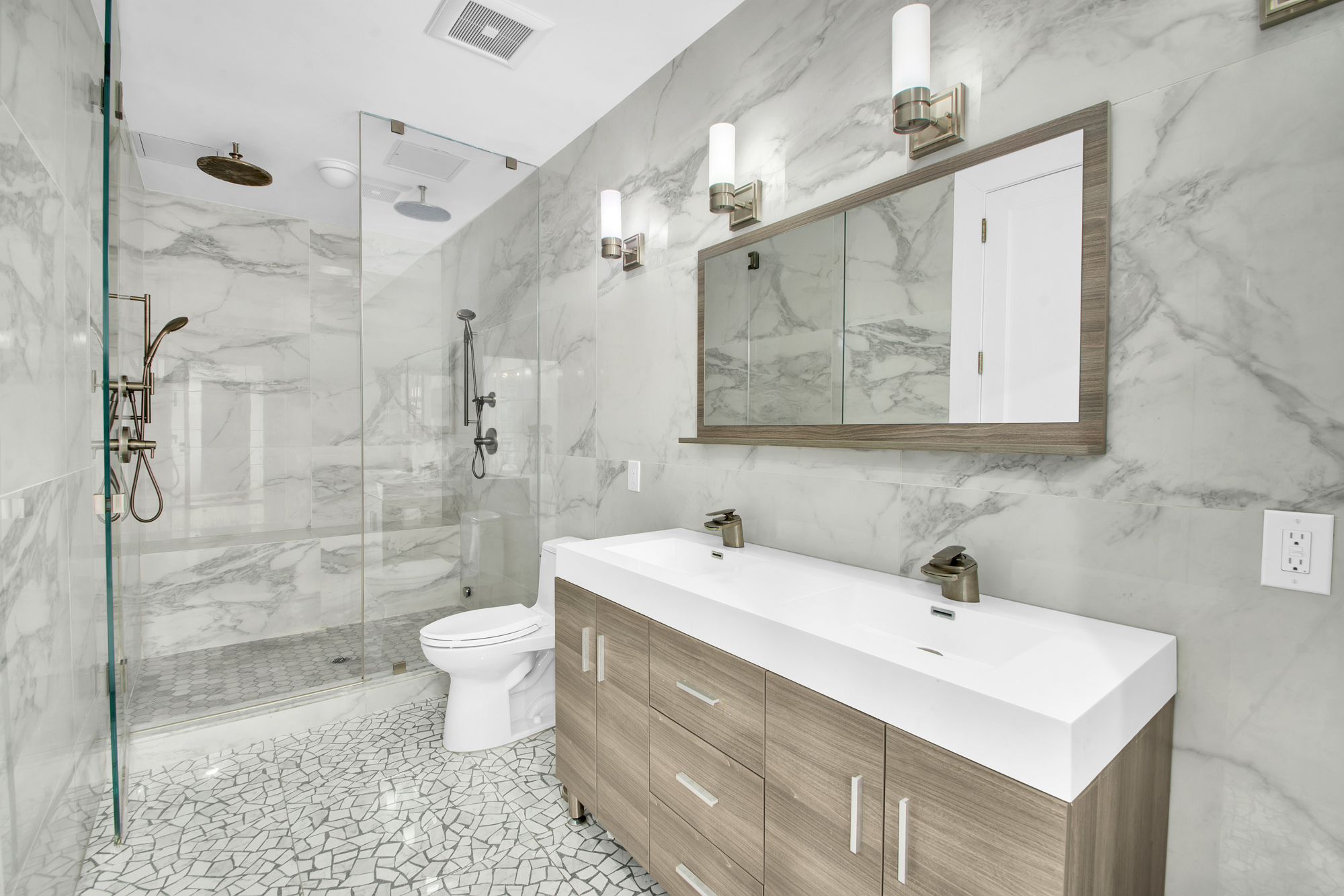 208 West 122nd Street Manhattan, NY 10027 - Photo 7 of 22 a bathroom with a sink toilet and shower