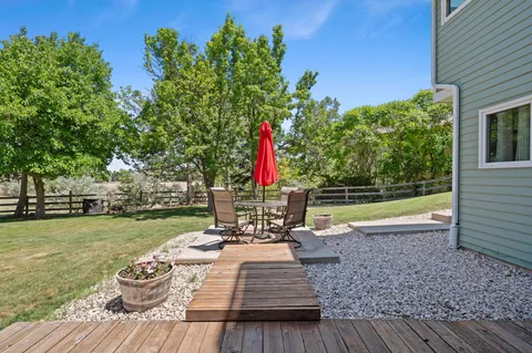 a view of a house with a big yard
