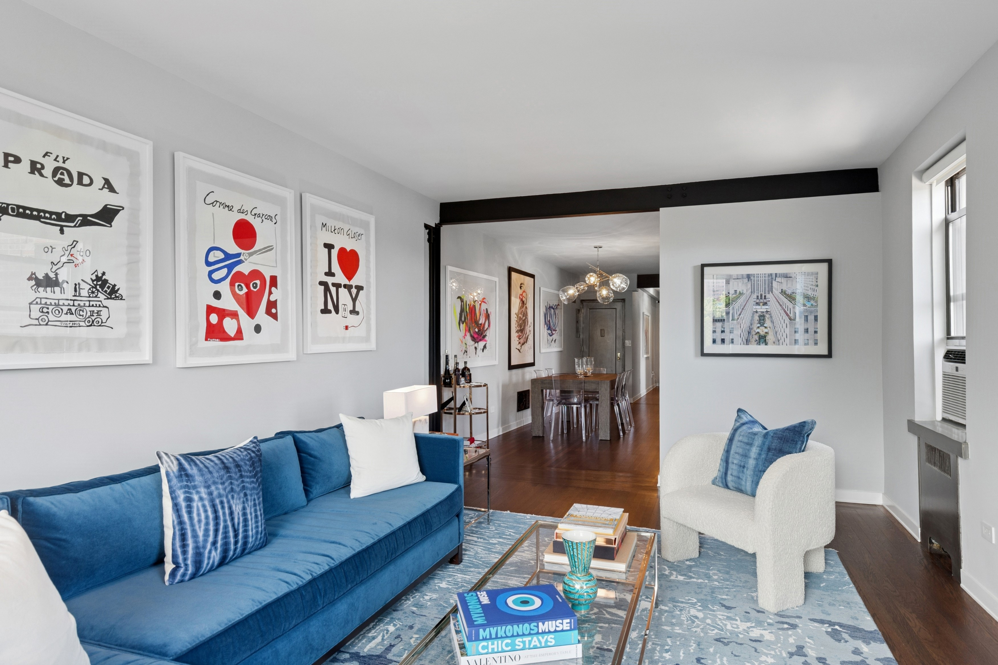 159-34 Riverside Drive West, Unit 5A Manhattan, NY 10032 - Photo 3 of 29 a living room with furniture and a wooden floor