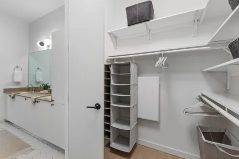 a view of an empty walk in closet