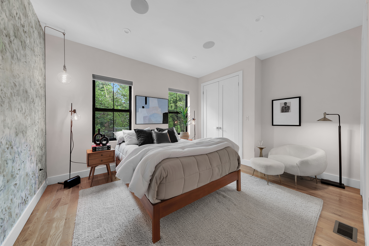 1118 Decatur Street Brooklyn, NY 11207 - Photo 8 of 18 a bedroom with bed and window