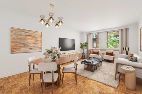a living room with furniture or couch and a flat screen tv
