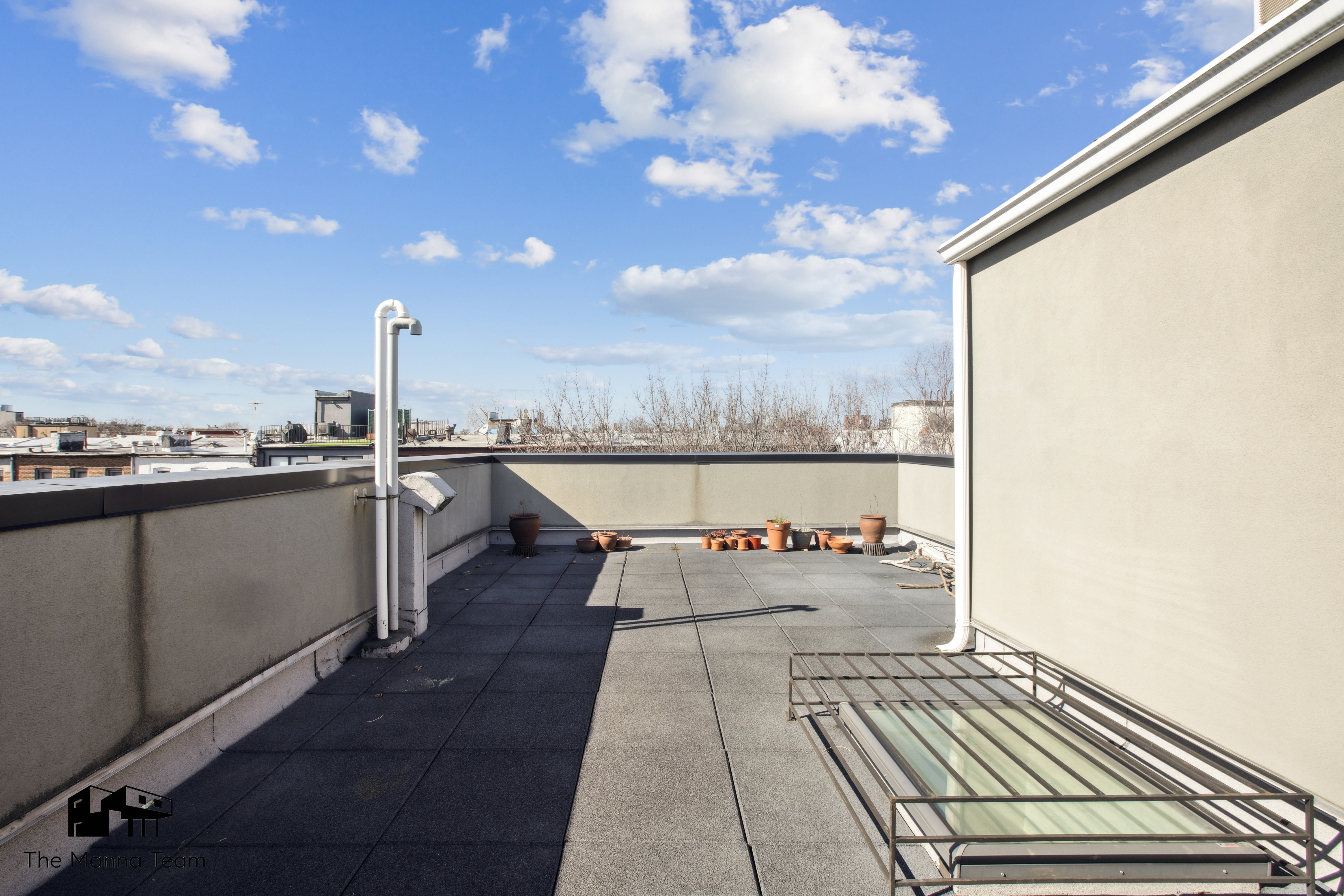 385 Jefferson Avenue, Unit C Brooklyn, NY 11221 - Photo 15 of 21 a terrace with a table and chairs