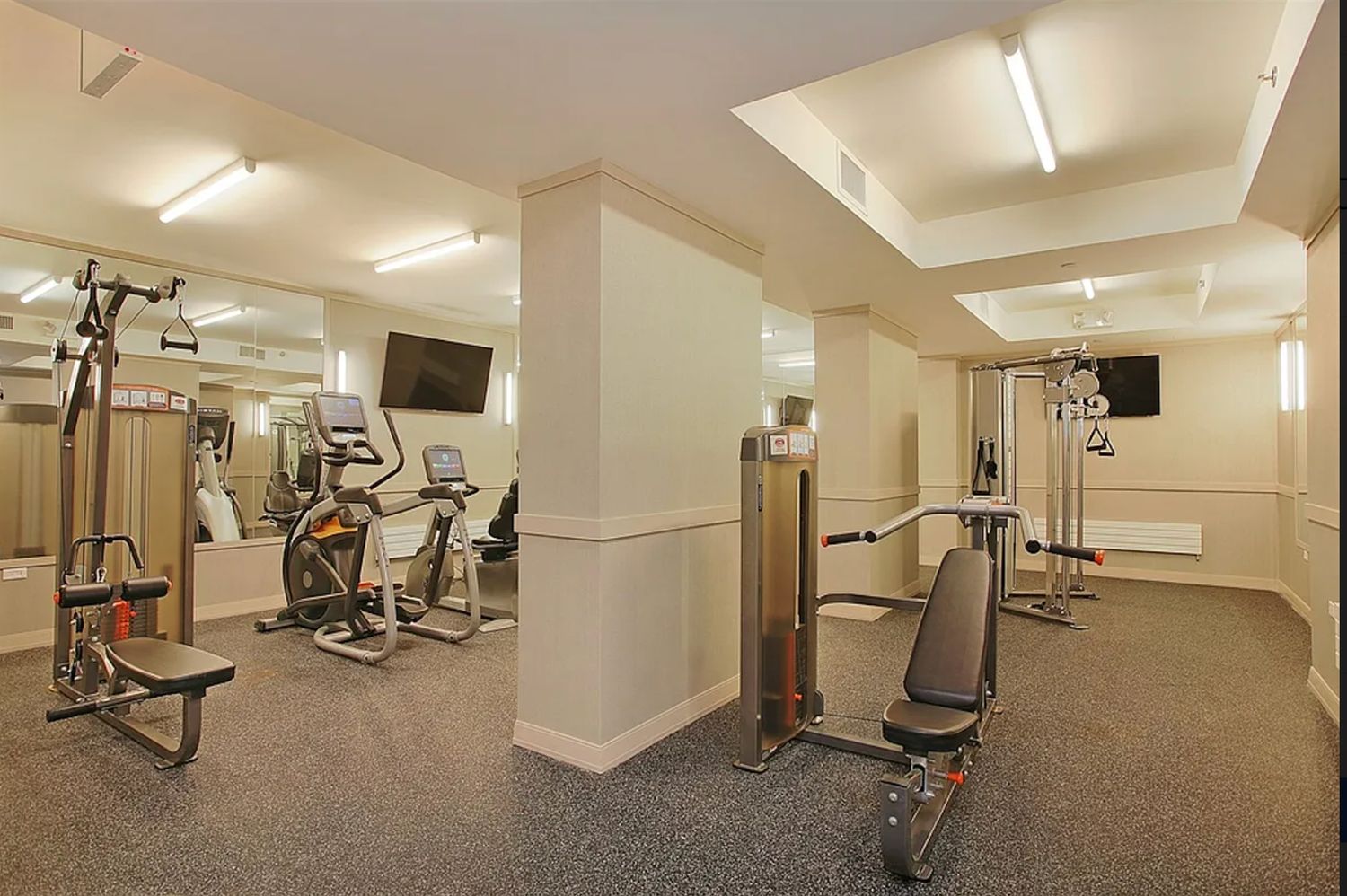 a view of a room with gym equipment