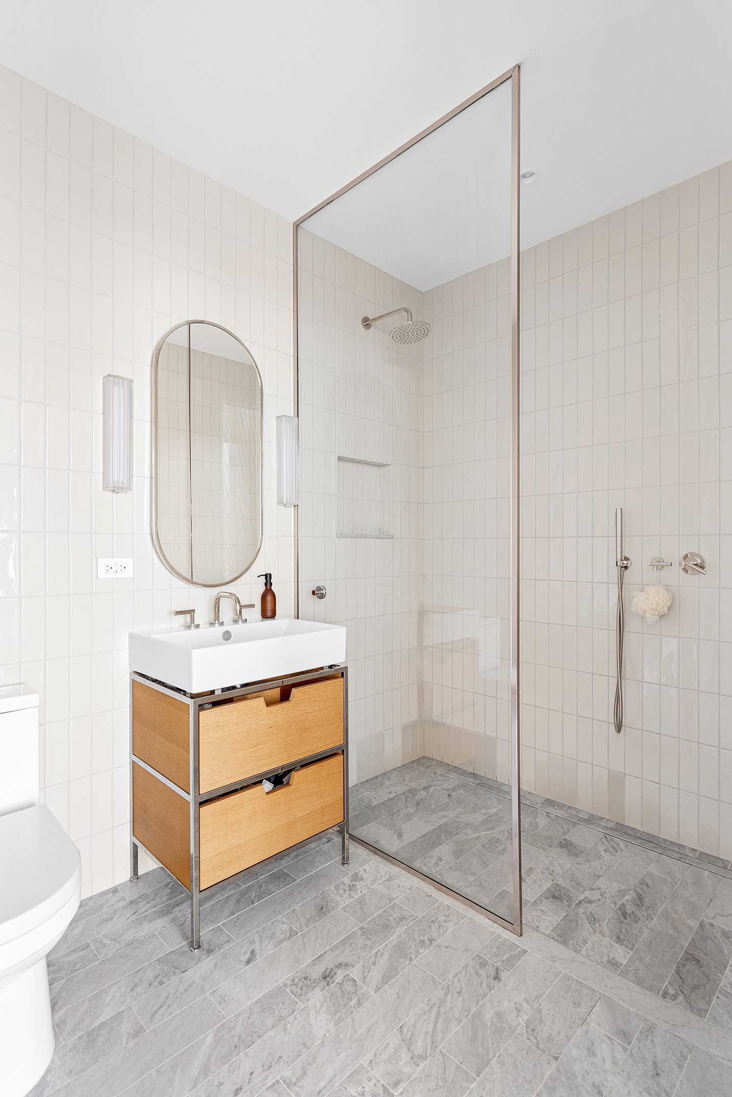 11 Hoyt Street, Unit 42C Brooklyn, NY 11201 - Photo 6 of 15 a room with painting on the wall and a mirror