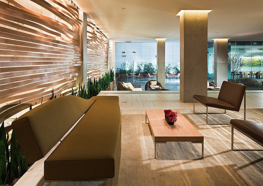 303 East 33rd Street, Unit B2 Manhattan, NY 10016 - Photo 10 of 24 a living room with furniture and a floor to ceiling window