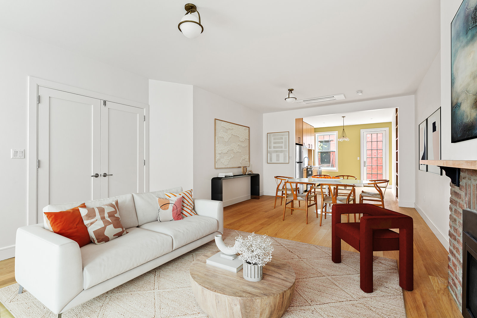 69 Hudson Avenue, Unit HSE Brooklyn, NY 11201 - Photo 4 of 20 a living room with furniture a fireplace and a table