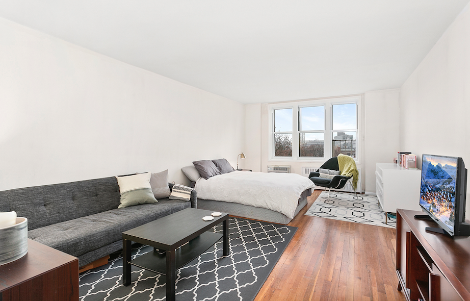 54 Orange Street, Unit 6D Brooklyn, NY 11201 - Photo 1 of 9 a living room with furniture and a wooden floor