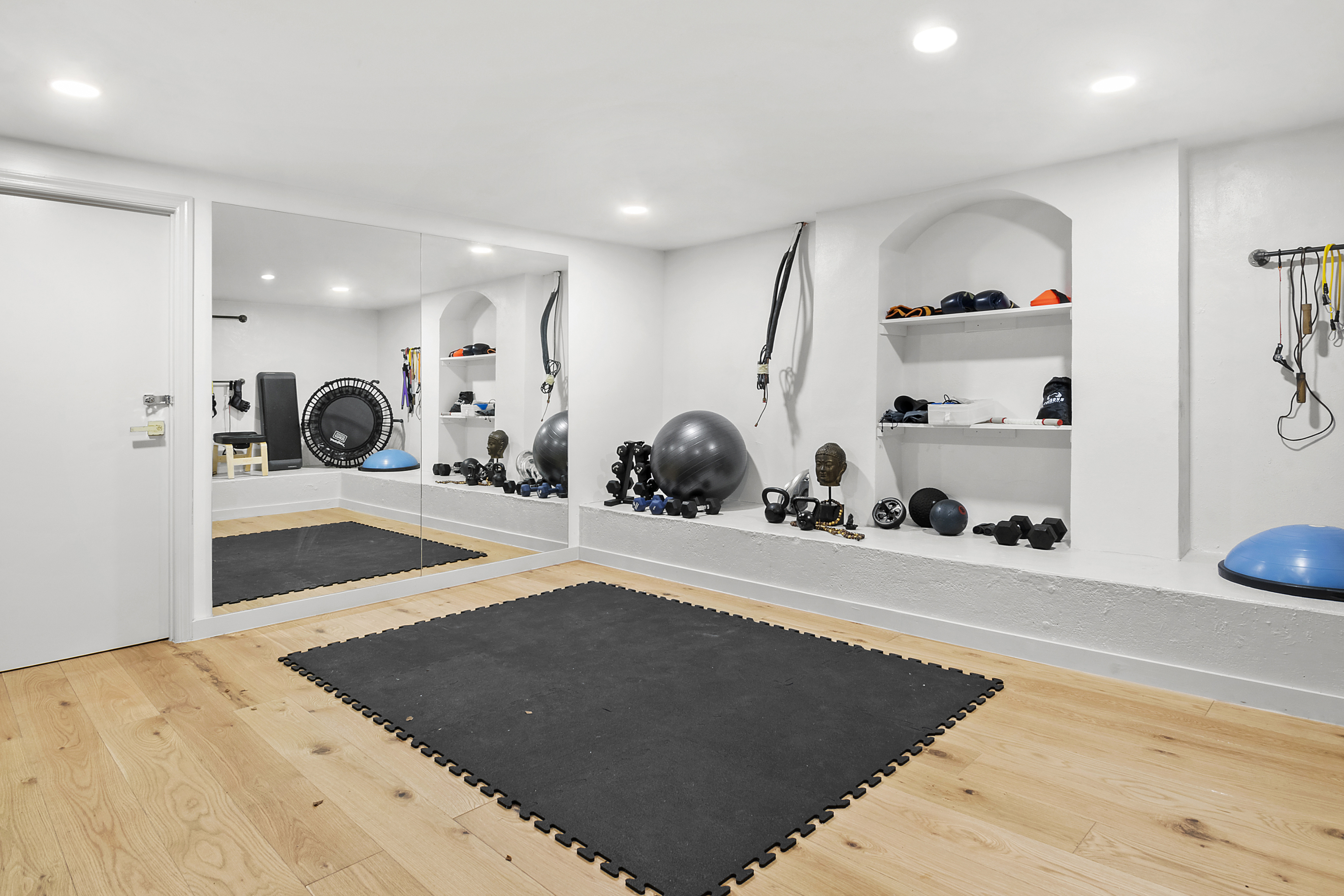 87 Monroe Street Brooklyn, NY 11216 - Photo 23 of 26 a view of a room with gym equipment