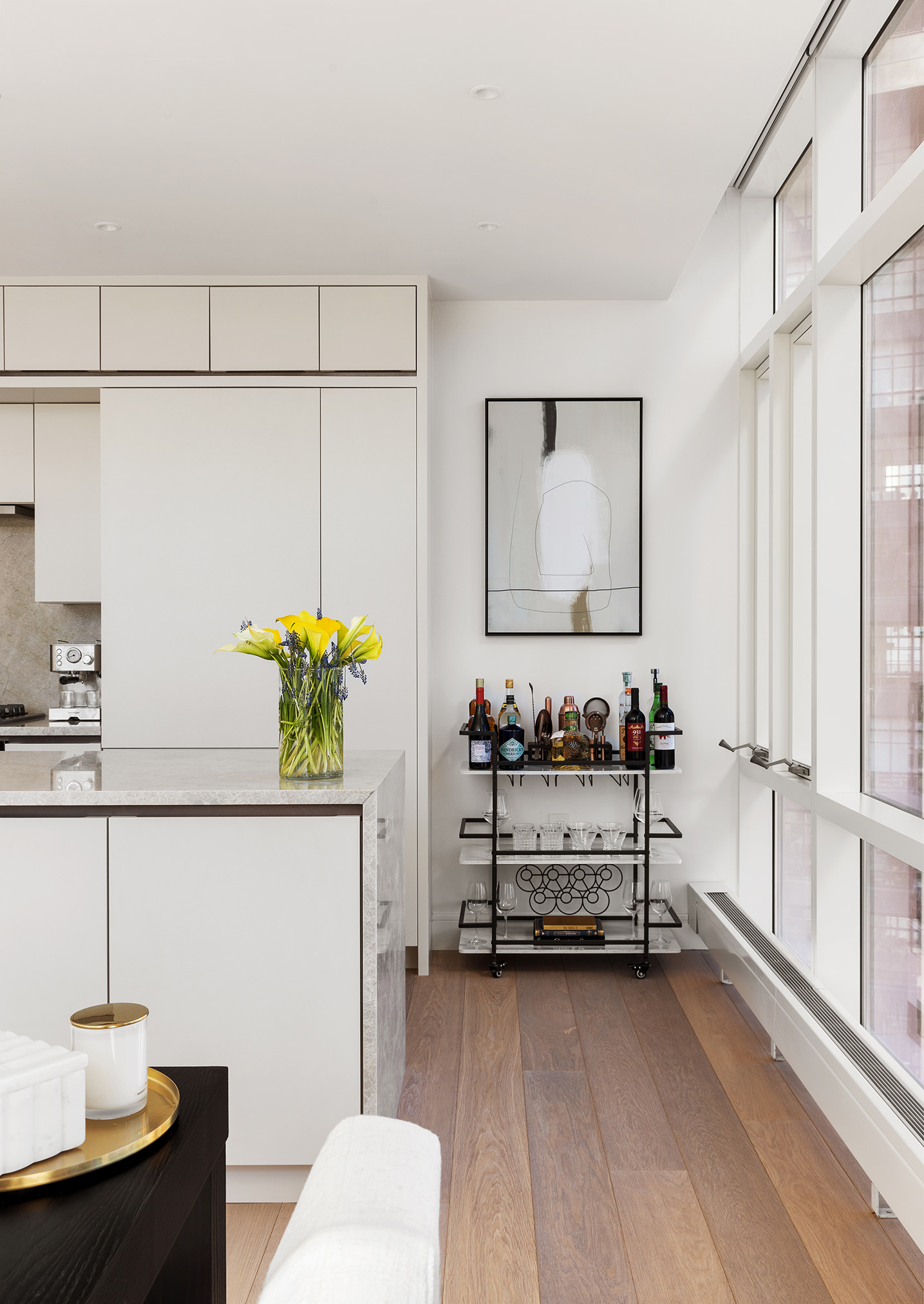 5 Beekman Street, Unit 21B Manhattan, NY 10038 - Photo 4 of 23 a living room with furniture and a potted plant