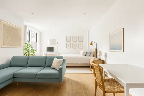 a living room with furniture and a couch