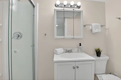 a bathroom with a sink and mirror