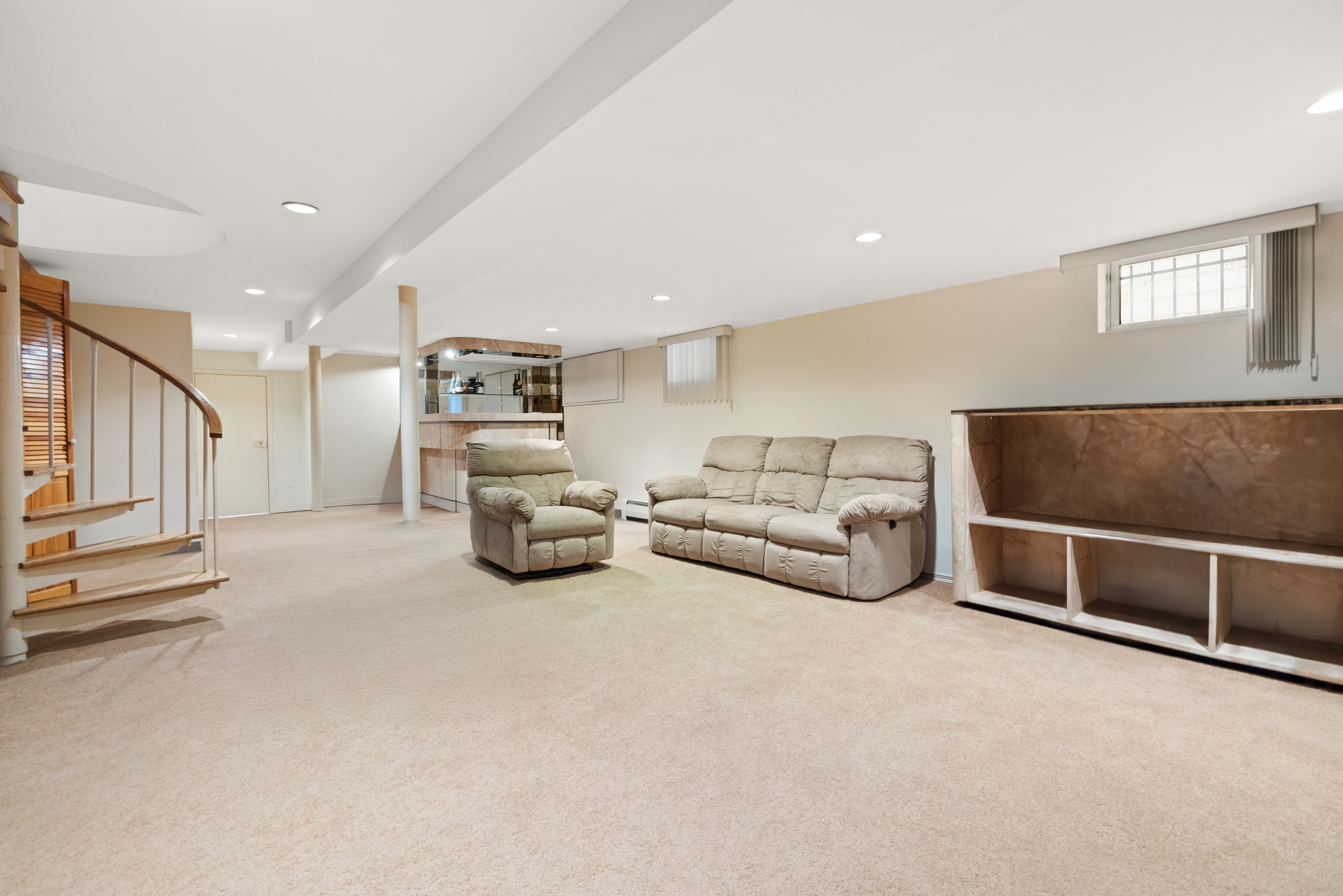 1635 West 12th Street Brooklyn, NY 11223 - Photo 16 of 21 a living room with furniture and a couch
